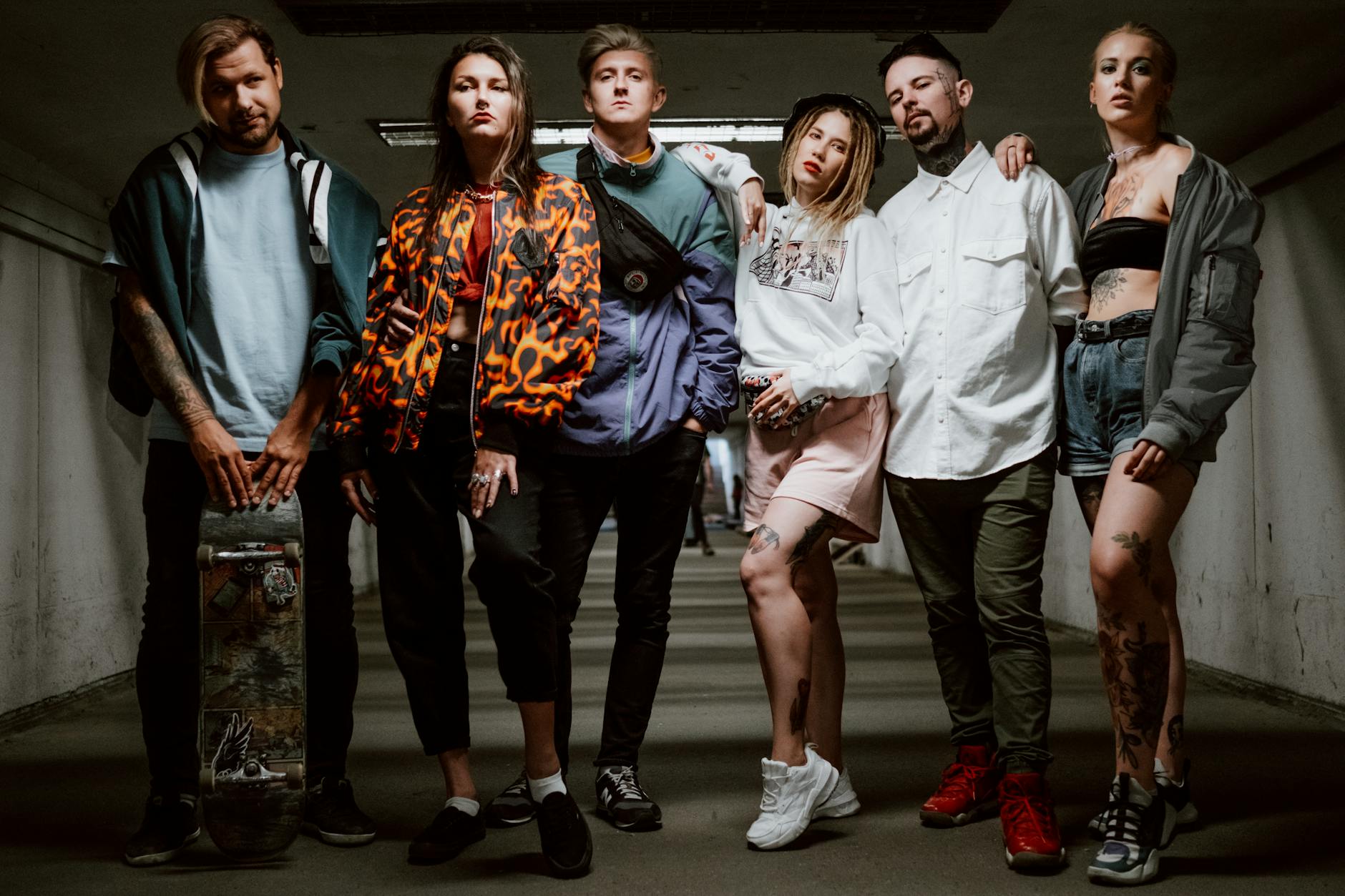 a group of people in an underground hallway